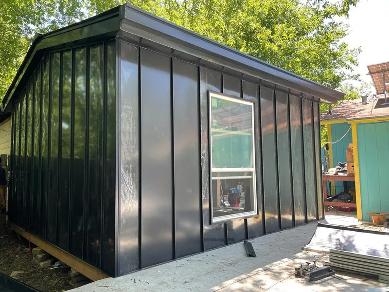 Black standing seam metal wall panels for Metal Roof Installation in Marysville